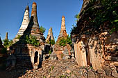 Inle Lake Myanmar. Indein, a cluster of ancient stupas  ruined and overgrown with bushes, just behind the village. 